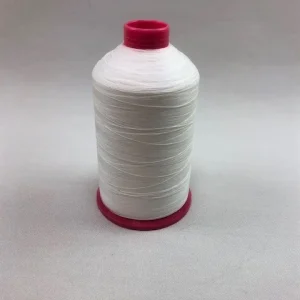 Liberty PTFE-Faden in der Farbe „Transparent“ auf einer Spule mit rosa Fuß