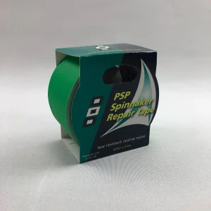 Rulle med grön PSP spinnakertejp bredvid produktförpackningen
