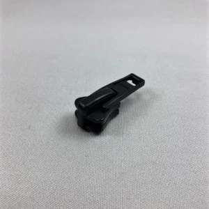 Imagen del producto: Corredor YKK de 10 mm, Delrin, plástico negro – simple