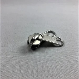 Imagen del producto: Corredor YKK de 10 mm, espiral, níquel metálico – doble
