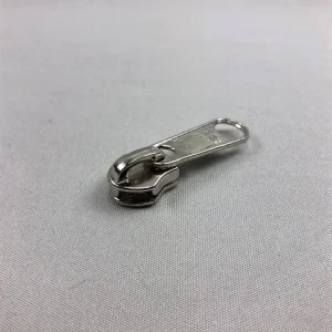 Imagen del producto: Corredor YKK de 10 mm, espiral, níquel metálico – simple